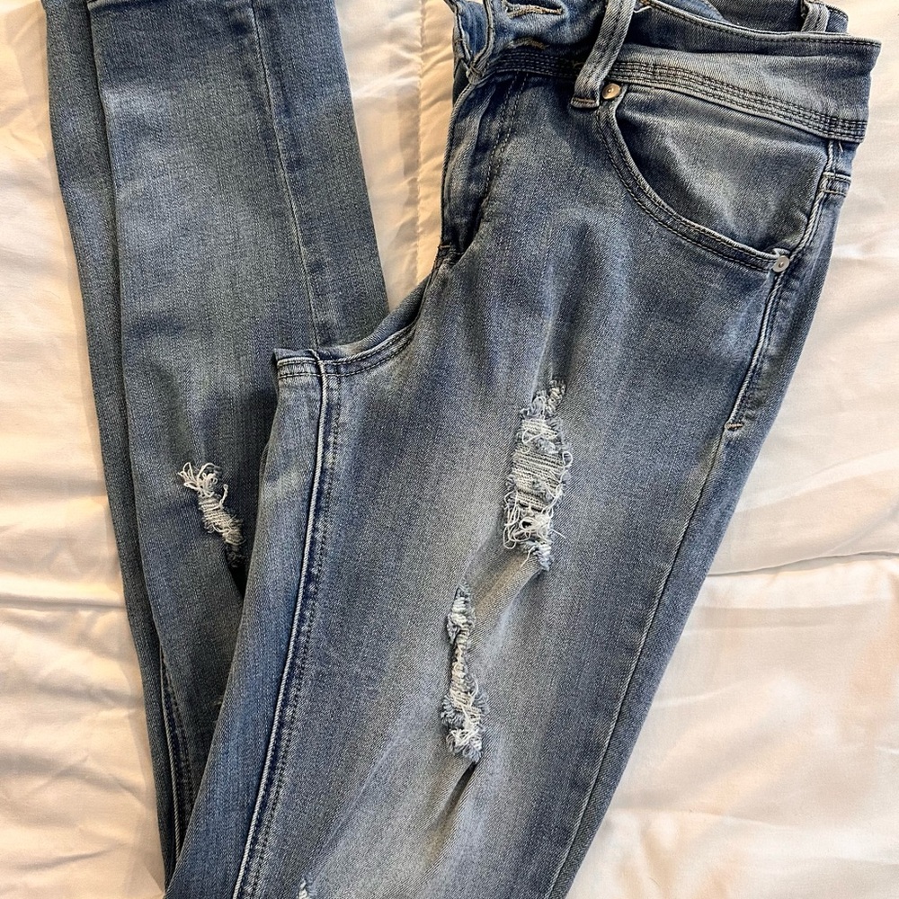 Distressed Blue Women's Jeans. Size 9